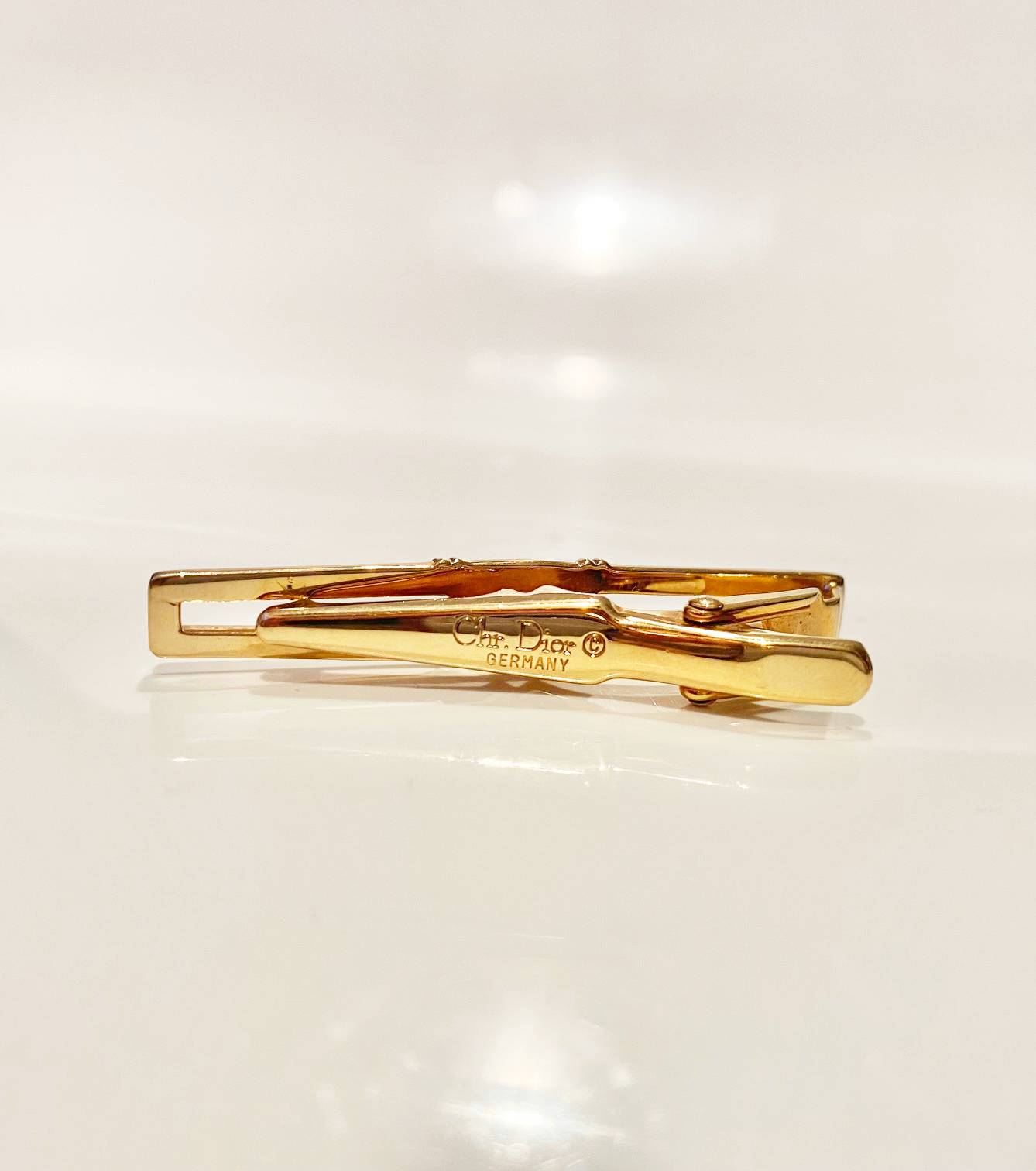1980s Christian Dior Gold Plated Tie Paper Clip - style - CHNGR