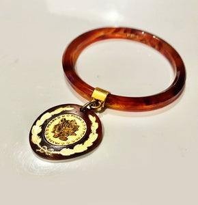 1990s Prada Resin Brown Bangle with Hanging Gold Metal Medallion - STYLE-CHNGR