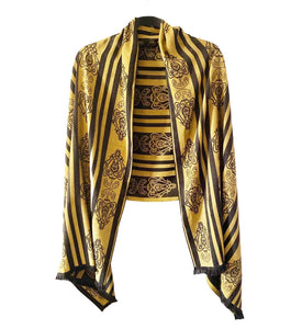 Gucci gold over the shoulder shawl with logo 